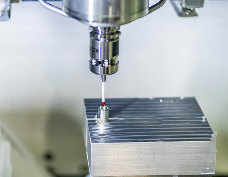 CMM coordinate measuring machine verifying aluminum part dimensions