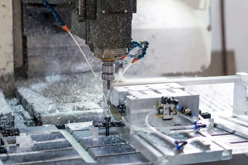 CNC milling aluminum part with chips flying